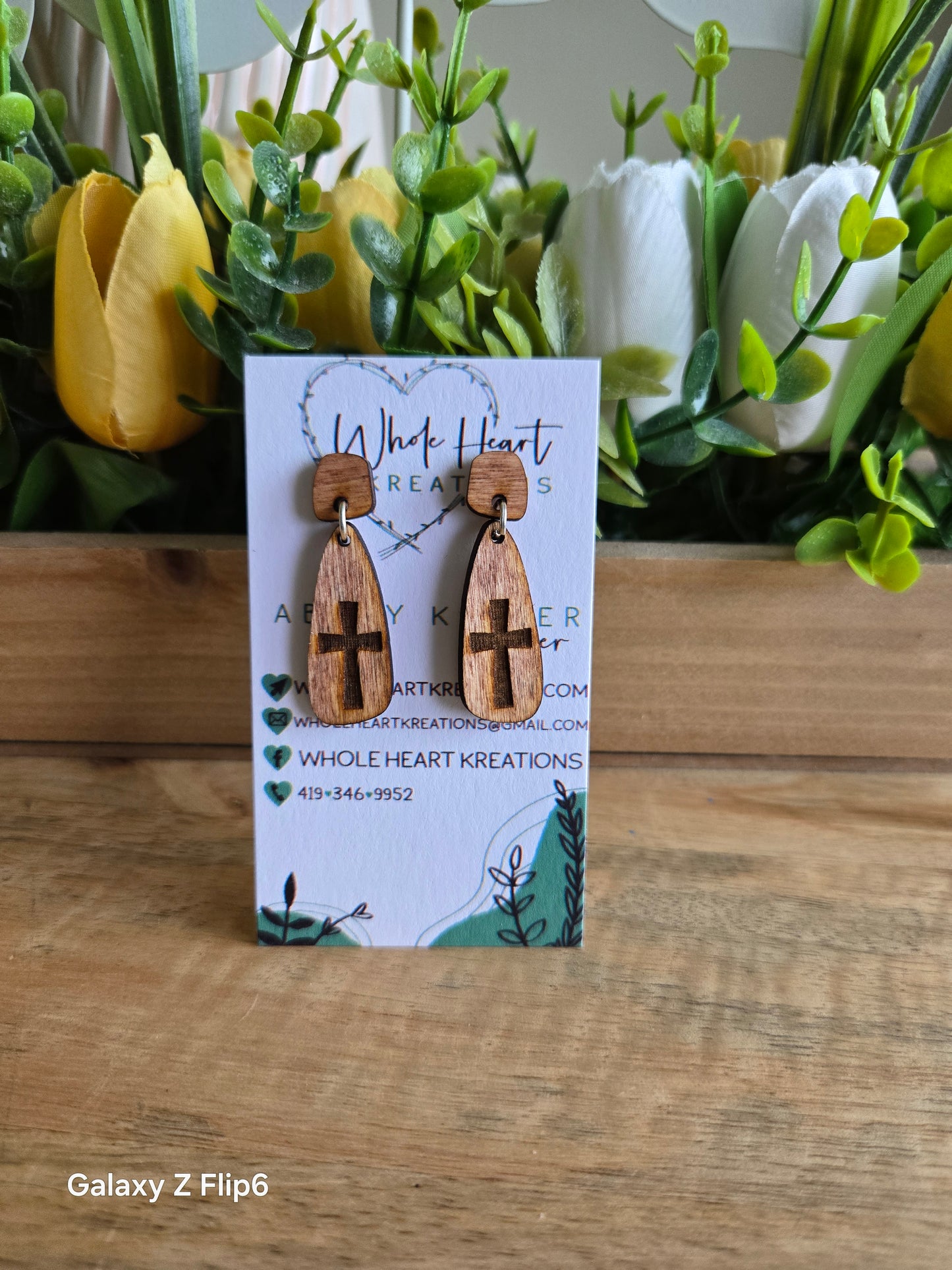 Double piece long cross studs