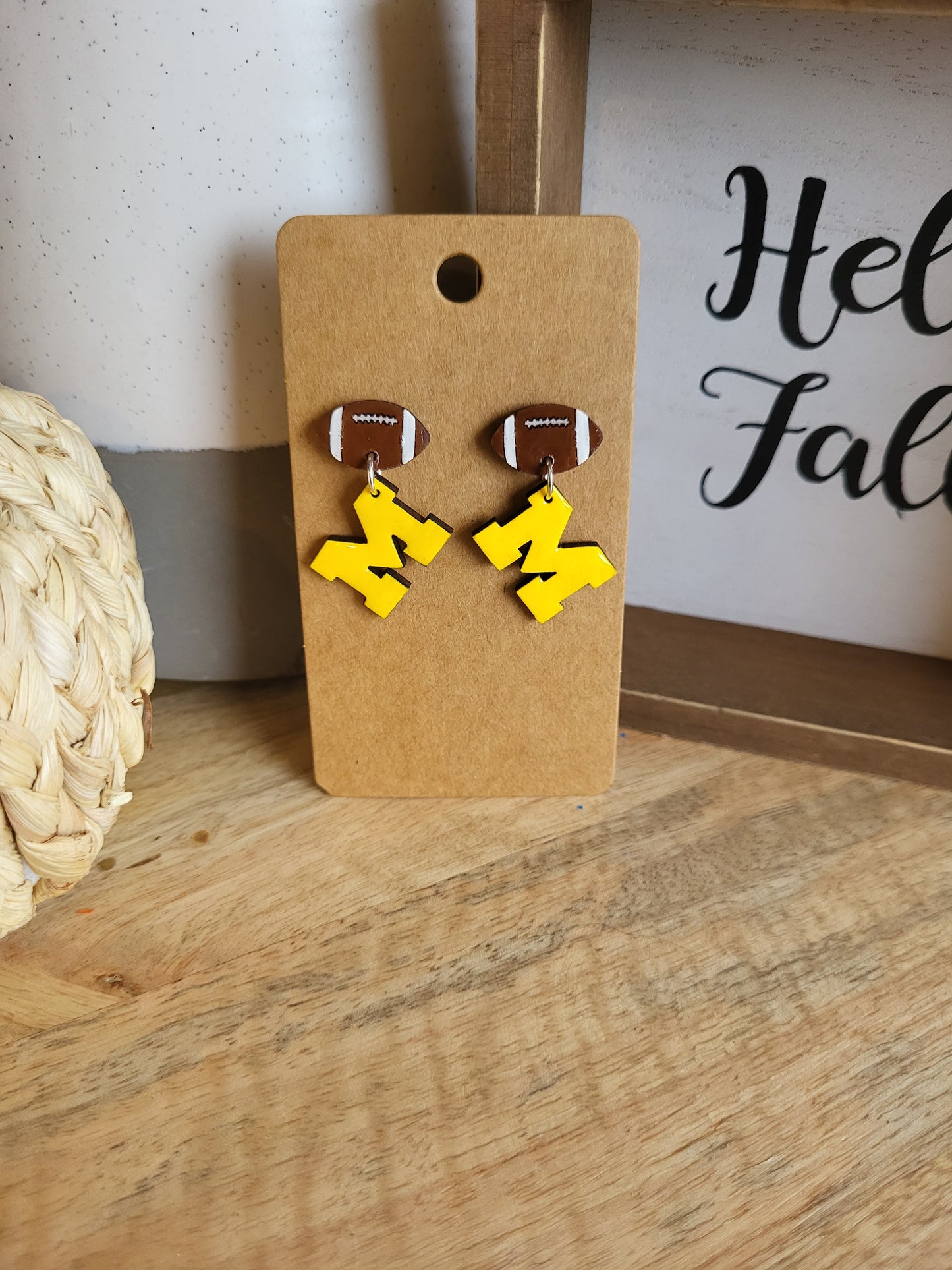 Yellow M football studs