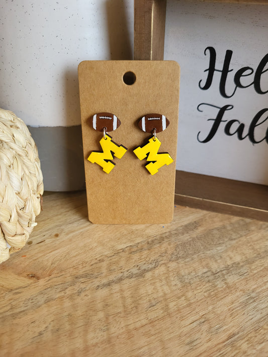 Yellow M football studs